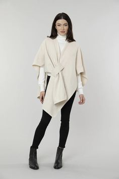 Stay warm in elegant style with our Knit Shawl Wrap. Designed with a pull-through front closure, it boasts a chic asymmetrical silhouette, blending the best elements of a cape, poncho, and shawl. Its soft knit makes it perfect for fall, ensuring you remain both cozy and fashion-forward. ONE SIZE Flare Jeans Shoes, Maxi Jumpsuit, Knit Shawl, Knit Wrap, Shawl Wrap, Retro Shirts, Knitted Shawls, Shoes With Jeans, Knitted Tshirt