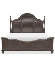 a bed with wooden headboard and slatted design on the frame, made from wood