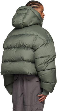 Lightweight down-filled quilted polyester taffeta jacket. · Bungee-style drawstring at hood · Zip closure with velcro placket · Welt pockets · Concealed bungee-style drawstring at hem · Concealed rib knit cuffs · Zip pocket at interior · Full nylon taffeta lining Fill: 90% duck down, 10% duck feather. Supplier color: Moss Sporty Nylon Puffer Parka, Urban Nylon Puffer Jacket With Detachable Hood, Functional Nylon Puffer Jacket With Drawstring Hood, Green Down Puffer Jacket For Streetwear, Quilted Nylon Puffer Jacket For Streetwear, Streetwear Quilted Nylon Puffer Jacket, Green Down Puffer Jacket With Padded Collar, Sporty Hooded Duck Down Puffer Jacket, Green Down Puffer Jacket