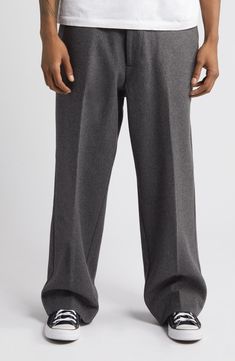 A roomy fit emphasizes the vintage spirit of pants tailored from a softly felted wool blend with flat-front construction and an easy, wear-everywhere feel. Exclusive retailer 30 1/2" inseam; 21" leg opening; 13 1/2" front rise; 20 1/2" back rise (size 32) Zip fly with button closure Front slant pockets; back button-welt pockets Adjustable buckle side tabs 50% wool, 40% polyester, 10% other fibers Machine wash, tumble dry Imported Formal Wool Pants With Welt Pockets, Wool Pants With Welt Pockets, Black Wool Bottoms With Welt Pockets, Wool Wide-leg Dress Pants With Welt Pockets, Wool Dress Pants With Welt Pockets, Ankle-length, Pants Tailored, Military Pants, Felted Wool, Easy Wear