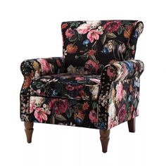 an upholstered floral chair with wooden legs