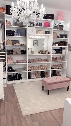 a walk in closet with lots of shoes and handbags on the shelves next to it