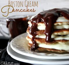 a stack of pancakes with chocolate drizzled on top and the words boston cream pancakes above it