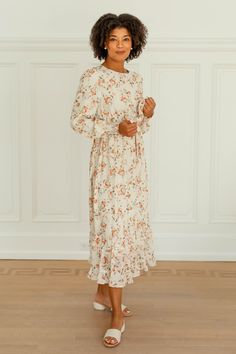 Created perfectly sweet + feminine, the 'Phyllis' floral dress is ideal for all your formal occasions this fall! The dress features a modest neckline, is fully lined, and has a dainty ruffled hemline. The pretty rust florals add the perfect autumn touch. Pair with heels, and feel beautiful and confident all day long! 100% Polyester Shell 100% Polyester Lining Fully Lined Hand Wash Cold Hang or Lay Flat to Dry Do Not Bleach Model Height 5'9" | Wearing Size Small Please carefully measure a similar Diana Wedding, Modest Neckline, Feel Beautiful, Layered Tops, Floral Ruffle, The Pretty, Blouse Dress, Tops For Leggings, How To Feel Beautiful