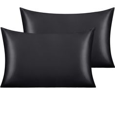 two black pillows sitting next to each other