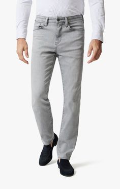 A grey jean is an effortless way to dress up your denim closet. This pair has a lighter hue and heavy washing and whiskering for a contemporary edge. Our Charisma fit has a relaxed straight leg and comfort rise, featuring a 5-pocket style.- - - 11.5" front rise 16.5" back rise 17.5" knee 16" leg opening Model is 6' and is wearing size W32/L32. Fabric: 57% Cotton, 16% Recycled Polyester, 14% Recycled Cotton, 11% Lyocell, 2% Elastane 10.75 oz Denim Made in Turkey Item: H001118-86048 Dark Comfort, Relaxed Straight Leg Jeans, Tapered Chinos, Blazer Fashion, T-shirt Polos, Chino Shorts, Sweater Fashion, Chinos Pants, Recycled Cotton