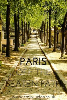 an image of a path with trees and the words paris off the beaten path