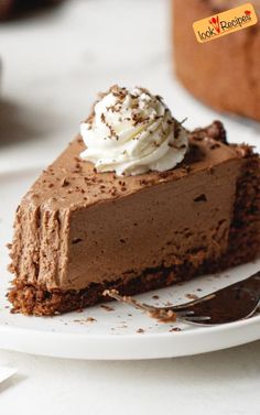 a slice of chocolate pie with whipped cream on top