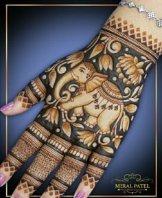 the hand is decorated with intricate designs