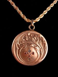 "This elegantly etched gold plate locket is on an 16\" vintage gold plate ( never worn) quality chain. The chain was added at a later date. . A victorian keepsake that has survived for well over 100 years. It closed and opens fine . 8-1-20" Antique Gold Locket Necklace Stamped 14k, Antique Medallion Locket Necklace Stamped 14k, Gold Medallion Locket Necklace Stamped 14k, Elegant Pendant Locket Necklace With Vintage Charm, Vintage Rose Gold Locket Necklace Gift, Vintage Rose Gold Locket Necklace For Gift, Vintage Charm Pendant Jewelry Keepsake, Antique Gold Necklace With Vintage Charm For Keepsake, Elegant Engraved Medallion Necklace For Formal Occasions