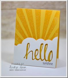 a yellow and white card with the word hello on it