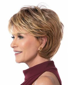 Toni Brattin Wigs Fiber: Heat-Resistant Synthetic Hair Cap Size: Average Hair Length:Front 3.5" | Crown 5" | Sides 2.5" | Back 4" | Nape 3.5" The Toni Brattin Marvelous Wig features a mid-length cut with subtle layering, lots of body, and easy styling. A great sporty yet chic, anytime look-the bangs can be worn full or Ponytail Hair Piece, Wig Outlet, Best Wig Outlet, Red To Blonde, Women's Wigs, Short Hair Haircuts, Short Hair With Layers, Synthetic Wig, Clip In Hair Extensions