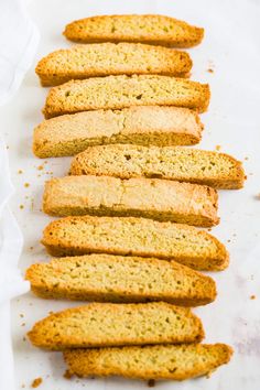 several pieces of bread are lined up on a table