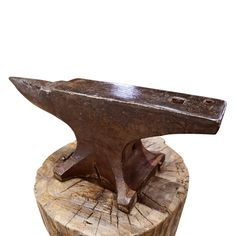 A striking 19th century American Blacksmith's iron anvil mounted with nails to it's original tree stump base. The anvil is attached to the stump with several hand-made nails. What a perfect piece of American folk art! Anvils For Sale, Branch Furniture, Spanish Projects, Blacksmith Anvil, Anvils, With Nails, Title Sequence, American Folk Art, Tree Stump