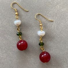 Holiday Earrings! This design earrings are made of green agate, pearls and red agate stones.  When people think of the colors red and green, one thing comes to mind: Christmas.  Red has long been a powerful color associated with fire, spiritual awakening, and the blood of Jesus Christ, whose birthday is celebrated on December 25.  Green often symbolizes money, good luck, and health through the holidays and into the new year. ☆ Those looking for earrings of different designs for the new year can Jade Beaded Dangle Earrings For Gift, Beaded Jade Earrings As A Gift, Red Agate Earrings With Natural Stones, Red Agate Earrings For Gift, Red Agate Earrings As Gift, Red Earrings With Natural Stones In Round Beads, Jade Earrings With Dangling Beads As A Gift, Red Pearl Dangle Jewelry, Jade Pearl Drop Earrings As Gift