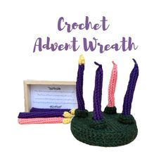 crochet adorn wreath with three candles in it