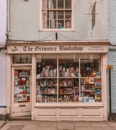 an old book shop with many books on display