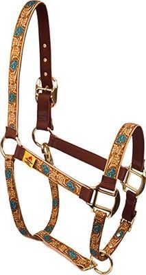 a brown and blue horse bridle with floral design on the front, gold trimming