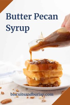 butter pecan syrup being poured onto a stack of waffles on a white plate