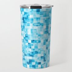 a blue and white mosaic tile pattern on a stainless steel travel mug