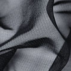 black and white photograph of sheer fabric