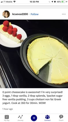 an image of a cake on the table with raspberries and cheesecake in it