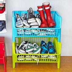 there are many pairs of shoes in the rack on the floor next to each other