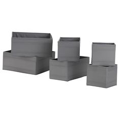 six grey storage boxes stacked on top of each other