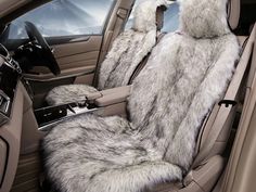 the interior of a car with sheepskin seats