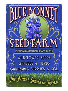 the bluebonnet seed farm sign is shown