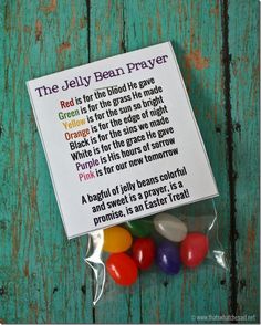 the jelly bean prayer card is on top of some candy