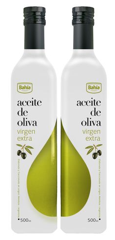 two bottles of olive oil on a white background