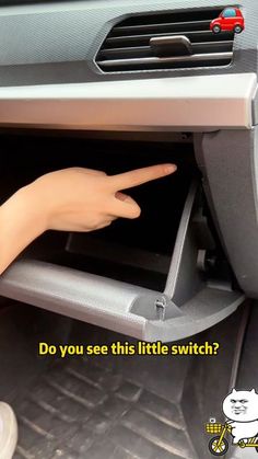 someone is pointing at the little switch on their car's dash board and it says, do you see this little switch?