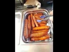 there are carrots being cooked in the sink