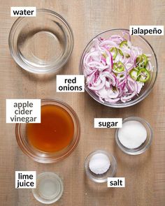 ingredients to make an apple cider vinegar recipe laid out on a wooden table top