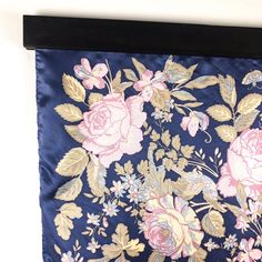 Made in Korea, this beautiful extra large silk scarf will be perfect for hanging on your wall or tying around your neck for an afternoon of sun and fun. Large enough for wearing as a swimsuit cover-up or adding color to your outfit. Printed on Silk Twill with a large floral design of dusty pink roses on a rich blue background.  This gorgeous scarf is shipped with our custom Black wall hanging scarf holder which is made from hardwood, painted with non toxic stain resistant solid black and complete with hooks on the reverse to enable you to easily display anywhere on the wall and allow you to change to any scarf you want. The holder is 35 inches wide so it can hold any scarf up to 35 inches. Simply take out the screws on the backside and slide your scarf off and then change it to the scarf y Black Wall Hanging, Dusty Pink Roses, Hanging Scarves, Laura Ashley Vintage, Scarf Holder, Large Silk Scarf, Black Wall, Vintage Scarf, Silk Twill