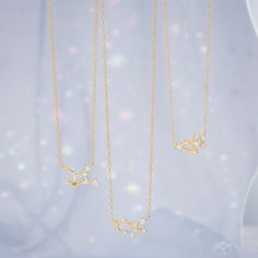 Unveil your inner strength and charisma with our Constellation Silver Necklace – Leo. This captivating piece captures the essence of Leo with a finely detailed silver pendant featuring the zodiac constellation. Bold and confident, just like the Leo traits, this necklace adds a touch of cosmic energy to your style. Wear it proudly to express your astrological identity and exude the magnetic attractiveness of Leo. DETAILS Plating: 18K Gold Materials:   18K Gold on Silver, Cubic Zirconia Length: Sagittarius Energy, Sagittarius A, Cosmic Connection, Leo Traits, Astrology Jewelry, Blue Morpho Butterfly, The Archer, Pearl Gifts, Constellation Necklace