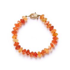 Fiery orange carnelians finished with our cheeky lobster clasp. Length 7". Ships within 5 business days. Orange Agate Gemstone Bracelets, Orange Carnelian Gemstone Bead Bracelets, Orange Carnelian Bracelets With Natural Stones, Handmade Orange Carnelian Beaded Bracelets, Orange Agate Gemstone Bead Bracelets, Carnelian Beaded Bracelets With Gemstones, Orange Agate Gemstone Beads Bracelet, Carnelian Gemstone Beaded Bracelets, Orange Bracelet With Lobster Clasp