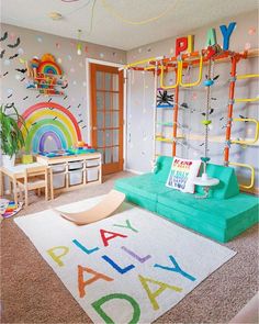 a child's playroom with toys and rainbows painted on the walls, carpeted flooring