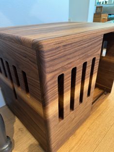 a wooden box sitting on top of a table