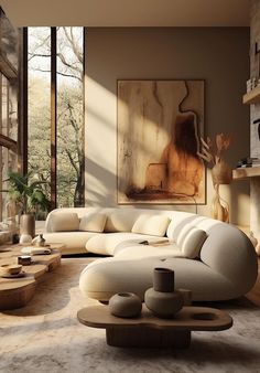 a living room filled with lots of furniture next to a large painting on the wall