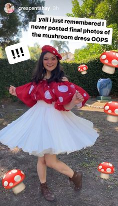 a woman in a red and white dress is posing for a photo with mushrooms on the ground