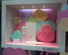 there is a display in the window of a store that sells valentine's day items