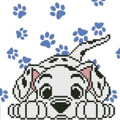 a cross stitch dog with paw prints on it