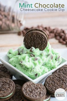 mint chocolate cheesecake cookie dip with oreo cookies on the side and text overlay