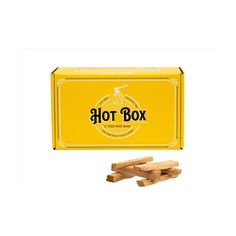 the hot box is next to some pieces of firewood in front of it on a white background