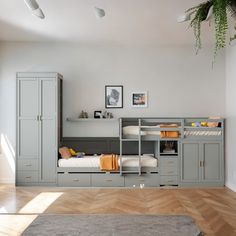 there is a bunk bed with drawers in the room