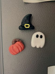 the refrigerator door is decorated with halloween decorations