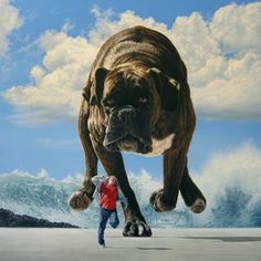 a man is standing in front of a painting of a large dog on the beach