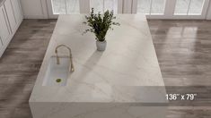 a white kitchen counter top with a sink and faucet next to it on a tile floor